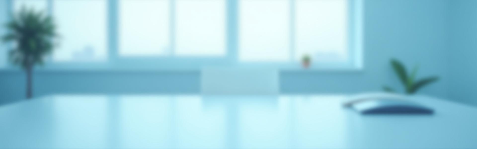 Clean, modern office space with a phone and bright, inviting light